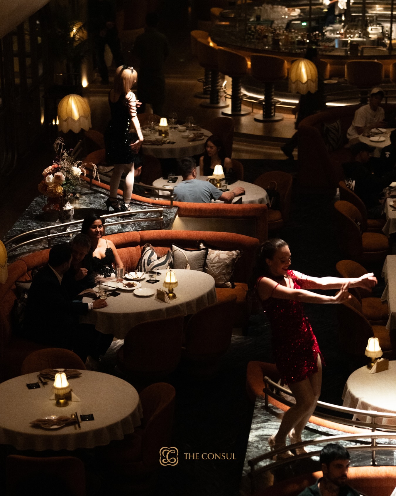 An evening at Rong Supper Club, with a dancer between the tables